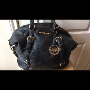 100% Authentic Michael Kors blk pebble leather.